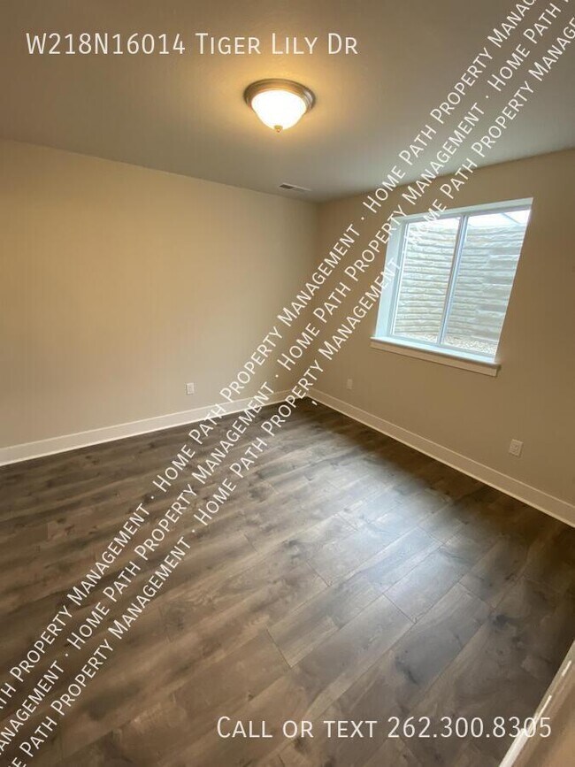 Building Photo - W218N16014 Tiger Lily Dr