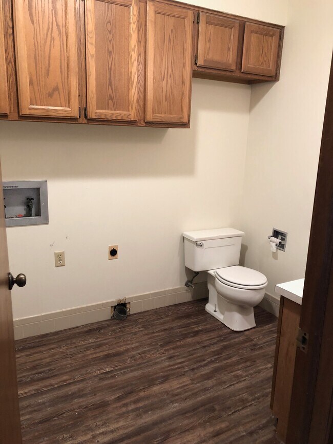 1/2 bath + laundry on ground level - 8713 W Thurman St