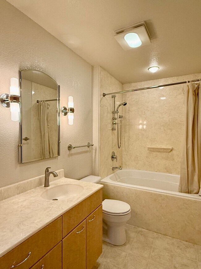 Building Photo - New Vinyl Plank Flooring, Fresh Interior Paint, 1 Car Garage + 1 Assigned Outdoor Parking Space -...