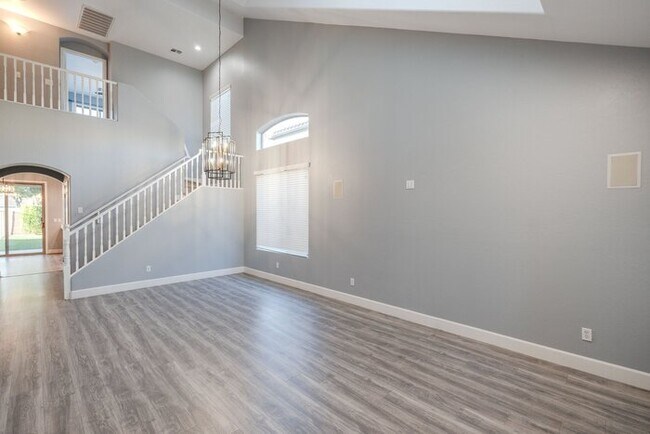 Building Photo - For Lease Beautifully Updated 4-bedroom, 2.5-Bathroom +Den, 1st Floor Office Gem, With a 2-car At...