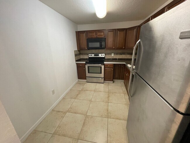 Building Photo - 2 Bedroom/2 Bathroom 1st Floor Condo at Cy...
