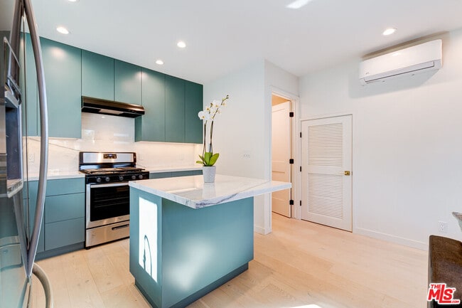 Building Photo - 12153 Palms Blvd