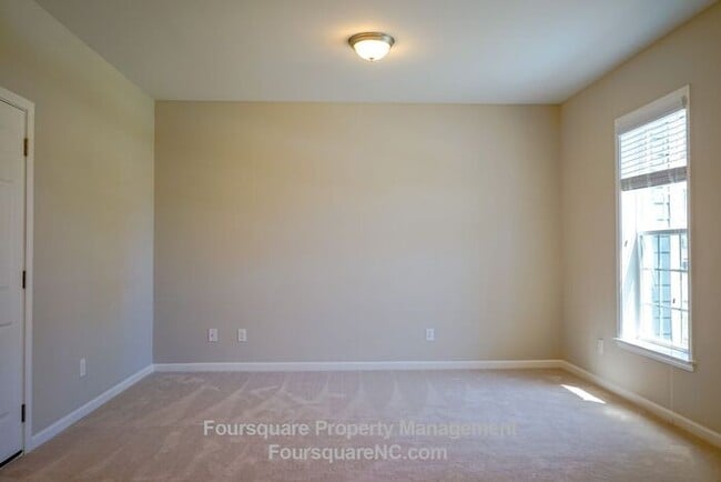 Building Photo - Modern 3-Story Townhome with Entry-Level Bonus Room, Back Deck & Garage , Community Pool in North...