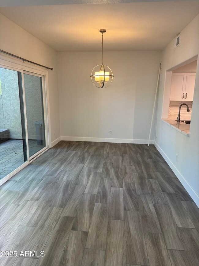 Building Photo - 7960 E Pepper Tree Ln