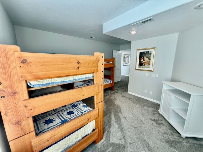 Building Photo - Furnished and Utilities Included: Two-Bedroom Basement Apartment with Private Yard