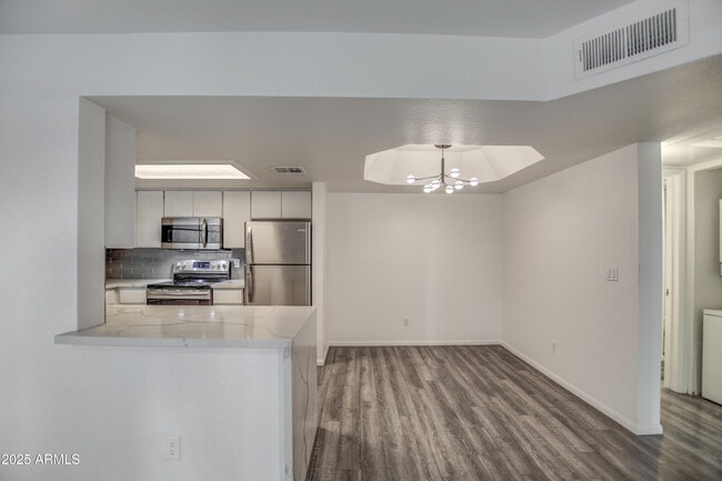 Building Photo - 4850 E Desert Cove Ave