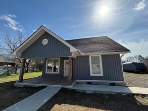 Building Photo - Welcome to this stunning new construction home located in the charming town of Atkins, AR.