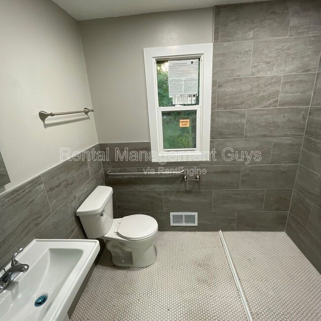 Building Photo - 8229 Halifax Ct N