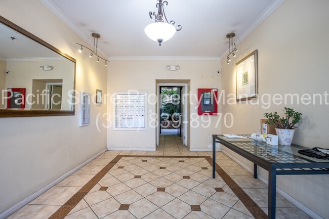 Building Photo - Elegant Westside Condo with Modern Upgrades and Private Patios