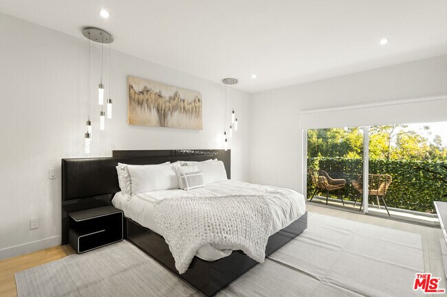 Building Photo - 10630 Wilkins Ave