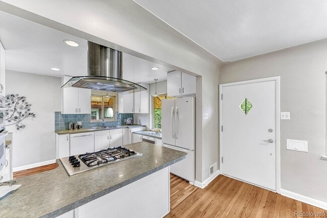 Building Photo - W 39th Ave Duplex