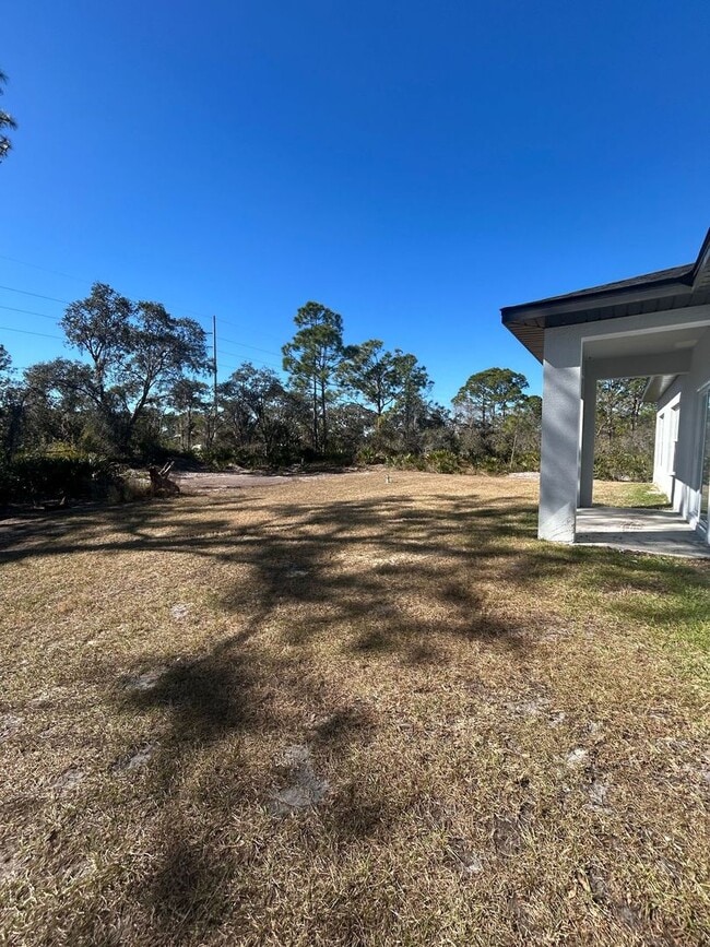 Building Photo - SPACIOUS 4 BEDROOM- 2 BATHROOM RETREAT IN BEAUTIFUL LAKE PLACID