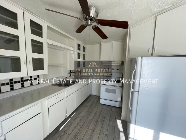 Building Photo - 7210 N 55th Dr