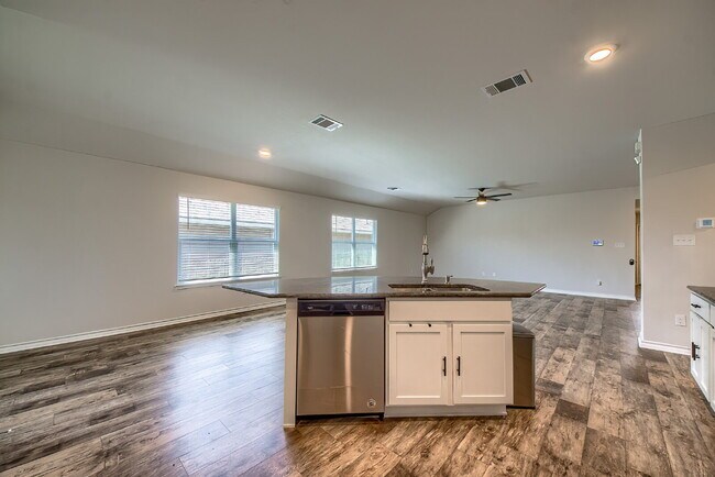 Building Photo - Welcome to this beautifully maintained 4-bedroom, 2-bathroom home in the highly desirable Whisper...