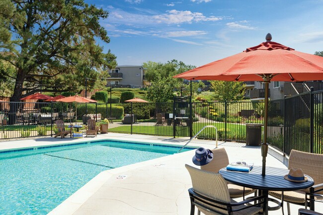 Pool-side patio at Pleasanton Heights Apartments - Pleasanton Heights