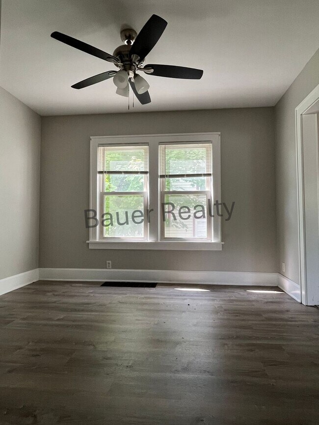 Building Photo - Three bedroom home with two car, detached garage!