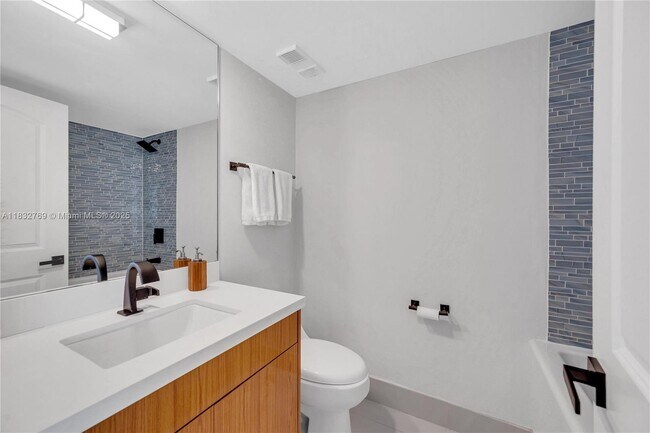 Building Photo - 10175 Collins Ave