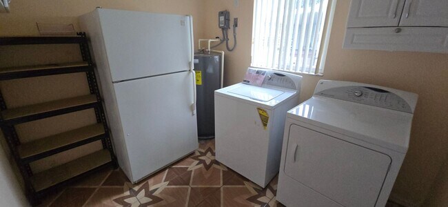 Building Photo - Move-In Ready 2BR/2BA Home with Solar & Bo...