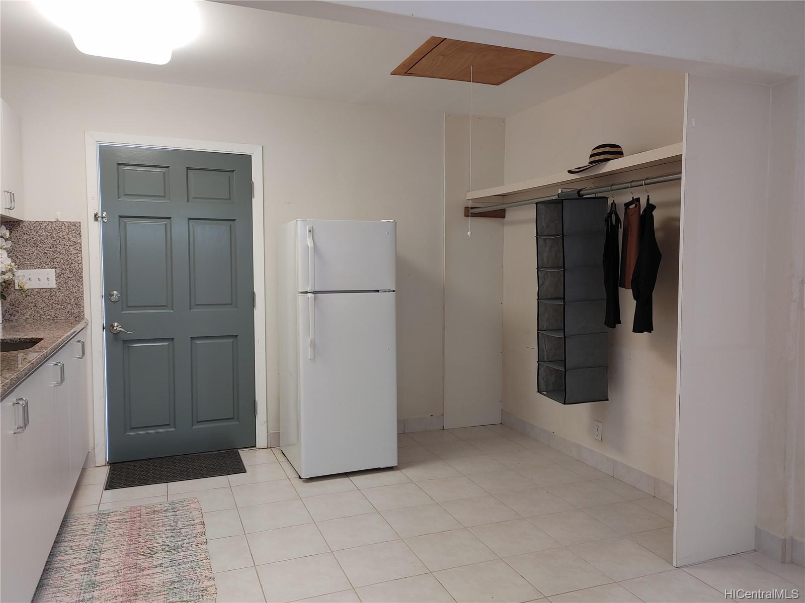 Plentiful storage in unit and above in attic - 1871 Halekoa Dr