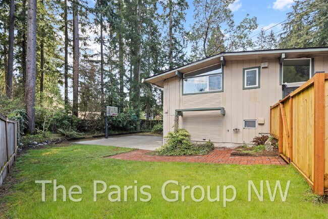 Building Photo - Fantastic Modernized Bridle Trails Mid Century Home * Central A/C, EV Charger, Exceptional Outdoo...