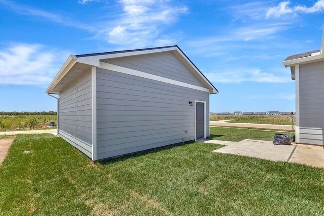 Building Photo - Modern 3-Bed Ranch in Maize – Zero-Entry L...