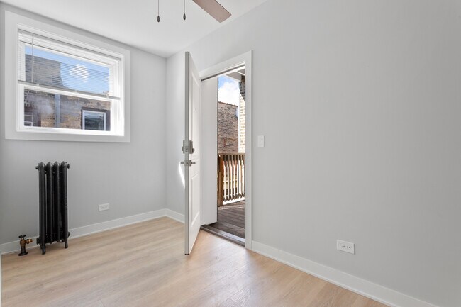 Building Photo - 7383 N Damen Ave