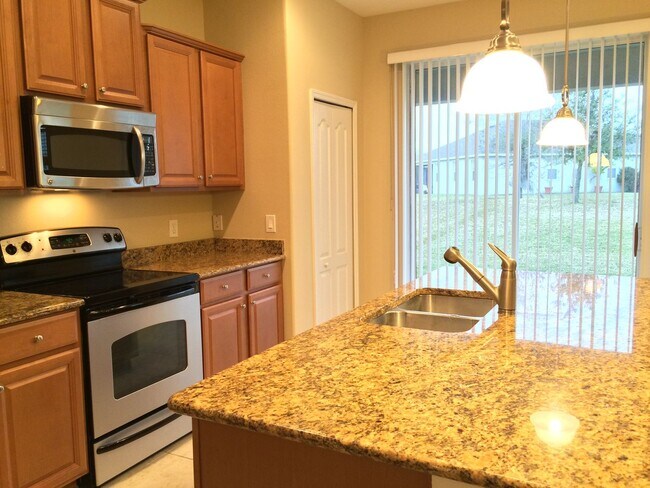 Building Photo - Beautiful 4/5 Bedroom Home in Wyndham Lakes