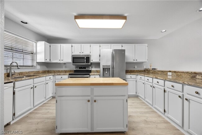 Building Photo - 6654 Tannin Ln