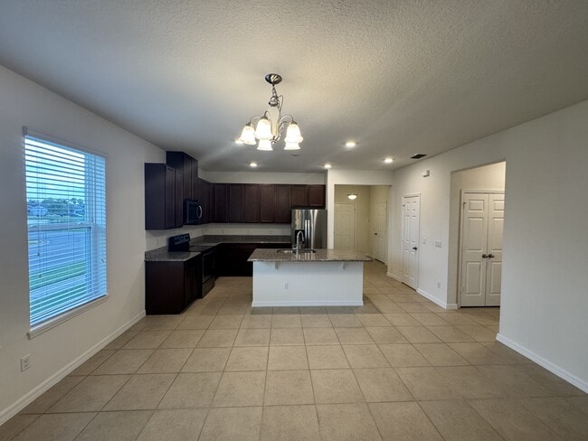 Building Photo - 12093 Stone Bark Trail