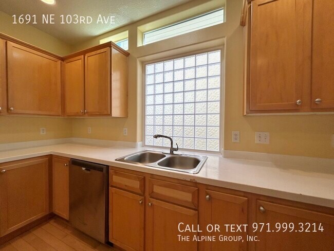 Building Photo - 1691 NE 103rd Ave
