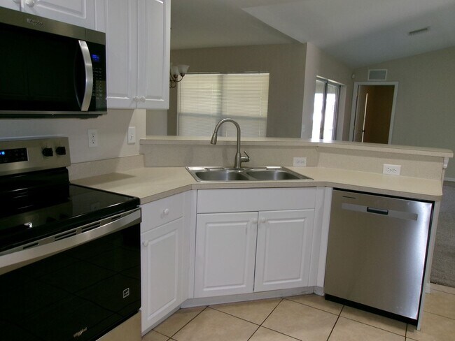 Building Photo - Available Now With 1/2 Off First Month's Rentl! Nice 3/2/2 Across From Oasis North School & Park