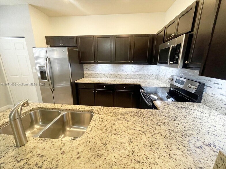 Building Photo - 10332 W 33rd Ct