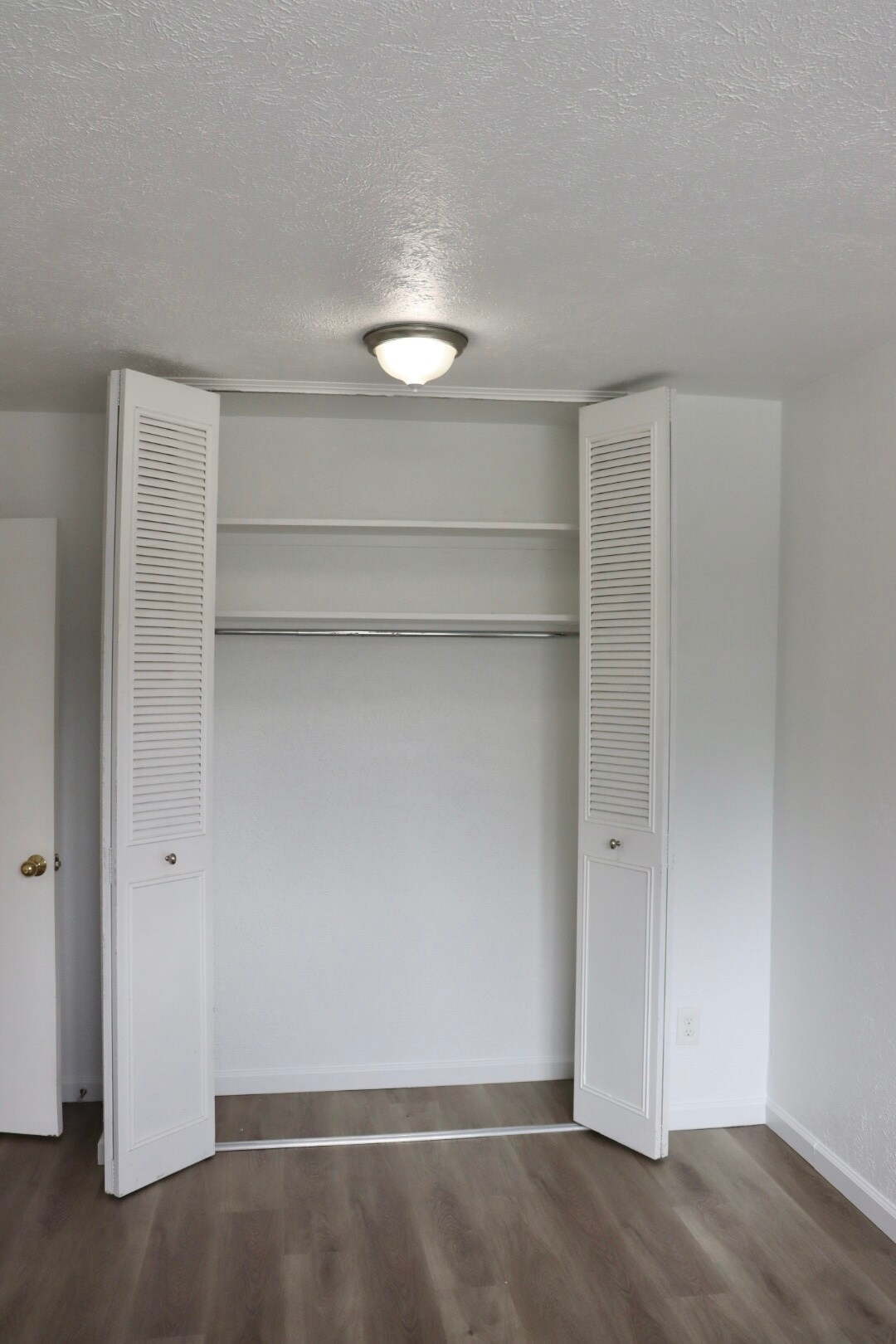 Upstairs west closet. - 6396 E Mississippi Ave
