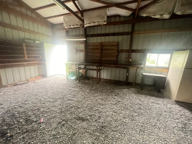 Building Photo - Three bedroom home with XL garage!