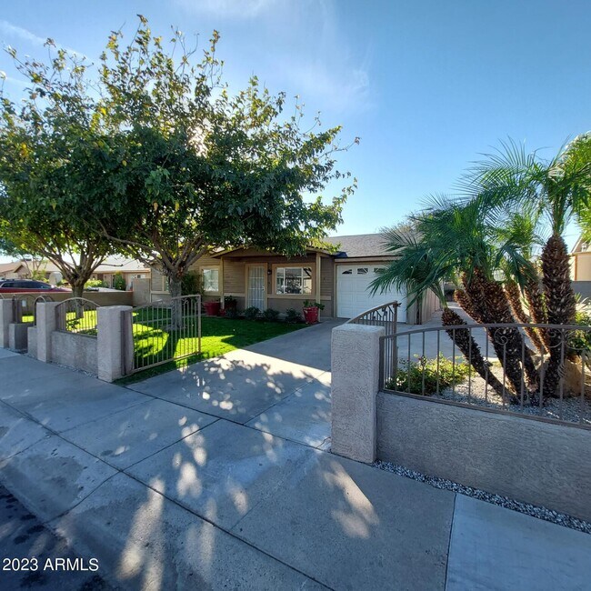 Building Photo - 1636 N 64th Dr