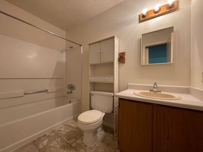 Building Photo - NICE 3 BEDROOM FEATURING AN ISLAND KITCHEN...