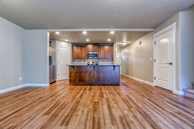 Building Photo - Centrally Located 4 Bedroom Townhome with Attached Garage & AC