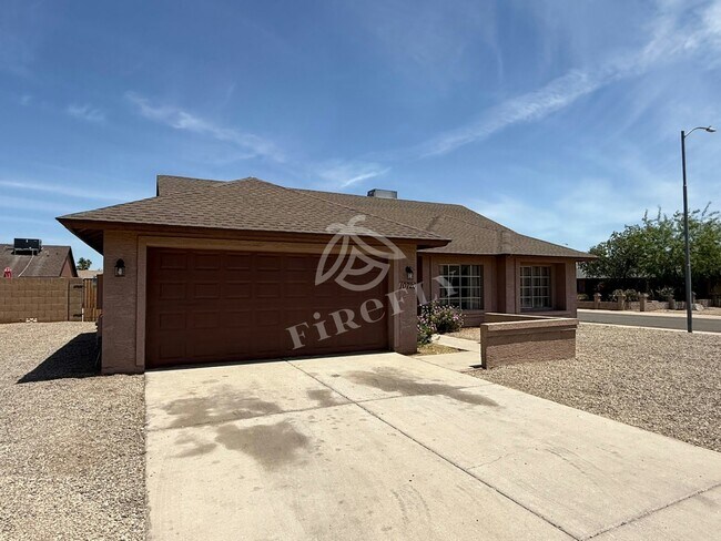 Building Photo - 10720 W Wagon Wheel Dr