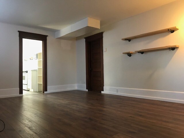 Living area facing entry into kitchen - 1303 44th Ave SW