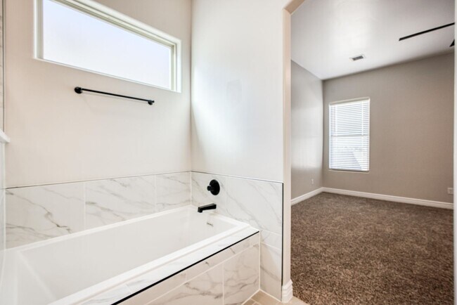 Building Photo - Beautiful East side House 4 bed-2.5 baths, part of The Club that includes Swimming Pool, Gym, Ten...