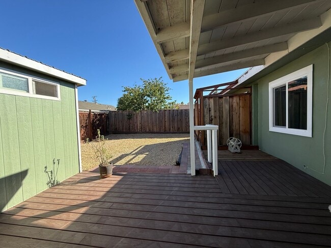 Building Photo - Hard floors, extra closets, patios & fenced yard