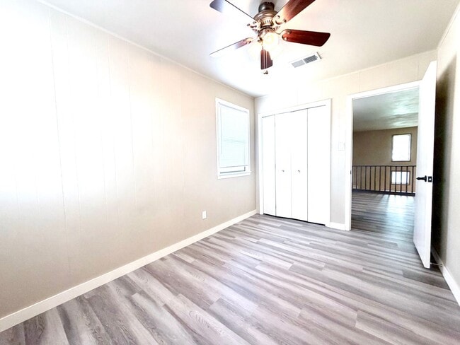 Building Photo - Stylish Two-Story Duplex with Loft, Fireplace & Private Backyard in New Braunfels!