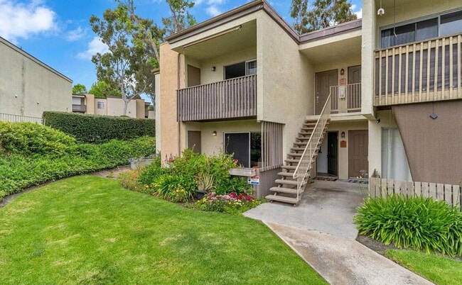 Building Photo - Turnkey ground floor condo in the coveted ...