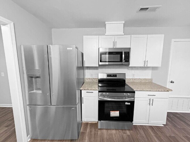 Building Photo - Luxury Fully Renovated 2-Bedroom with Brand-New Finishes – Minutes from Cordova Mall and NAS Pens...