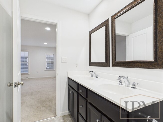 Building Photo - 2-bedroom 2.5 bath Luxury Townhome located...