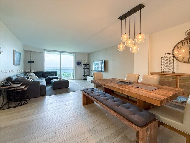 Building Photo - 10275 Collins Ave
