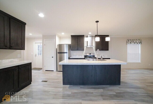 Building Photo - Spacious 4-Bedroom Home with Lawn Maintena...