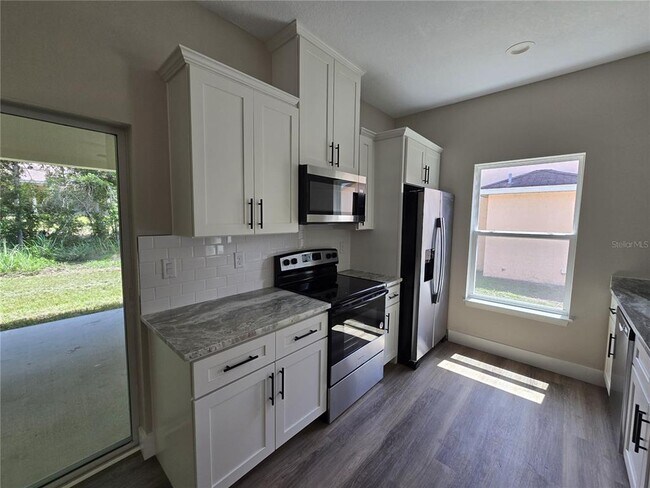 Building Photo - 7437 Mead Dr
