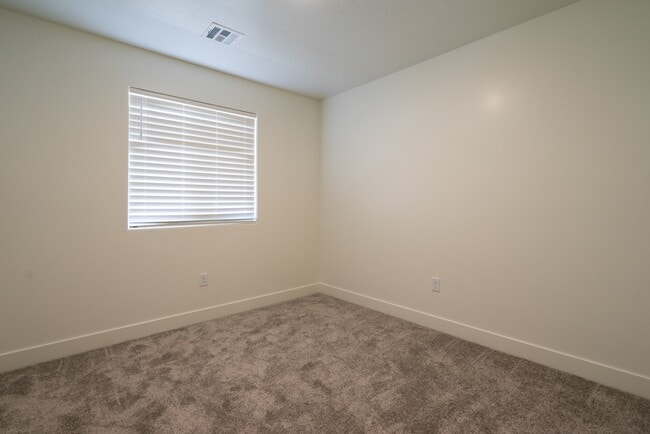 Building Photo - Modern 4-Bed Stand-Alone Home with Fenced Patio