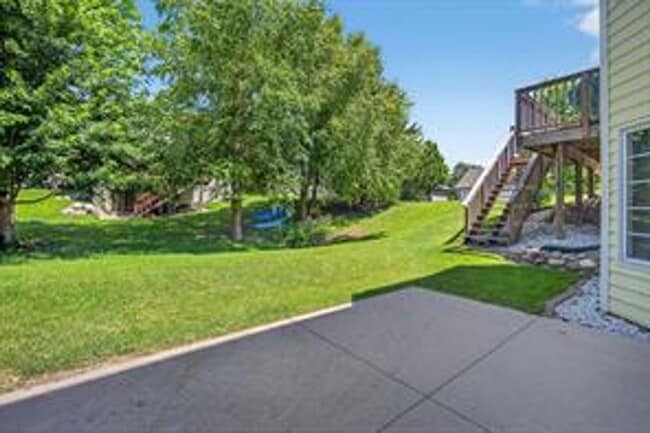 Building Photo - Spacious 5-Bed Walkout Home with Over 3,50...